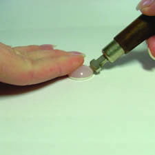 Bezel roller pushing in the bezel cup